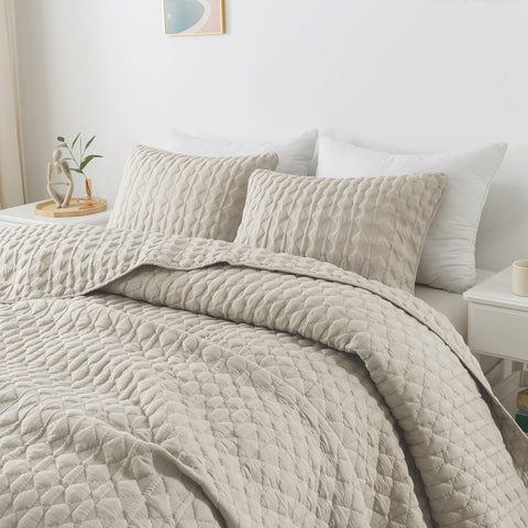 WDCOZY light beige oversized Cal King quilt folded for easy styling.