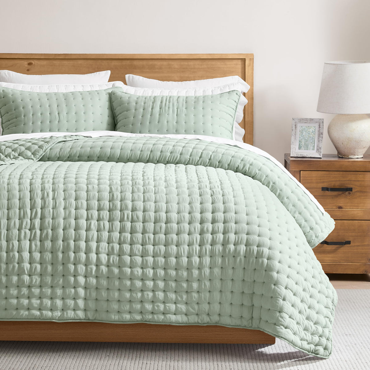 WDCOZY sage green king quilt folded on bed for quick styling.