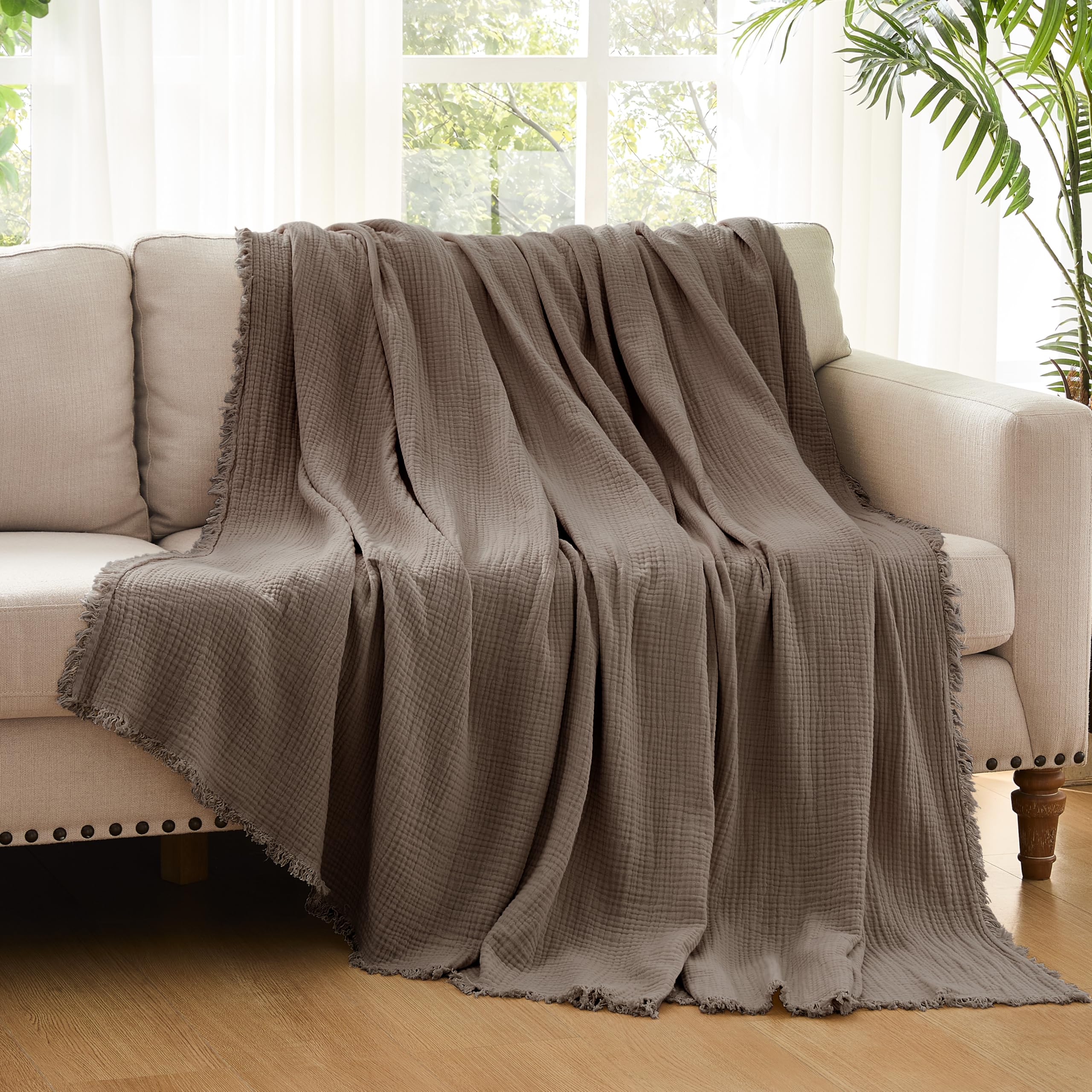 WDCOZY blanket on bed demonstrates breathable fabric for all-season comfort.
