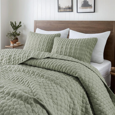 WDCOZY oversized California King quilt in sage green draped on bed for all season comfort