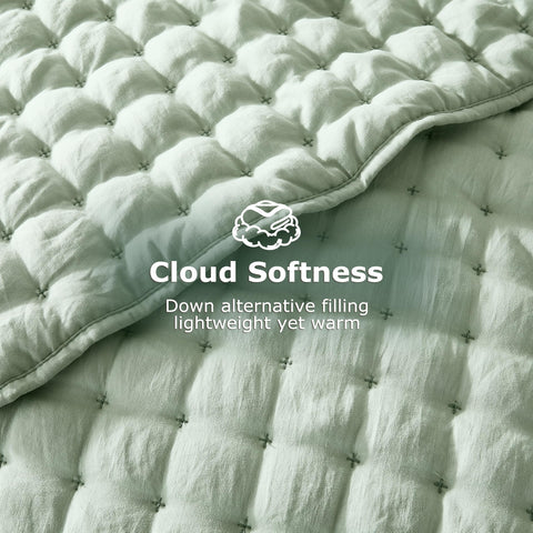 WDCOZY sage green quilt close-up shows soft brushed fabric.