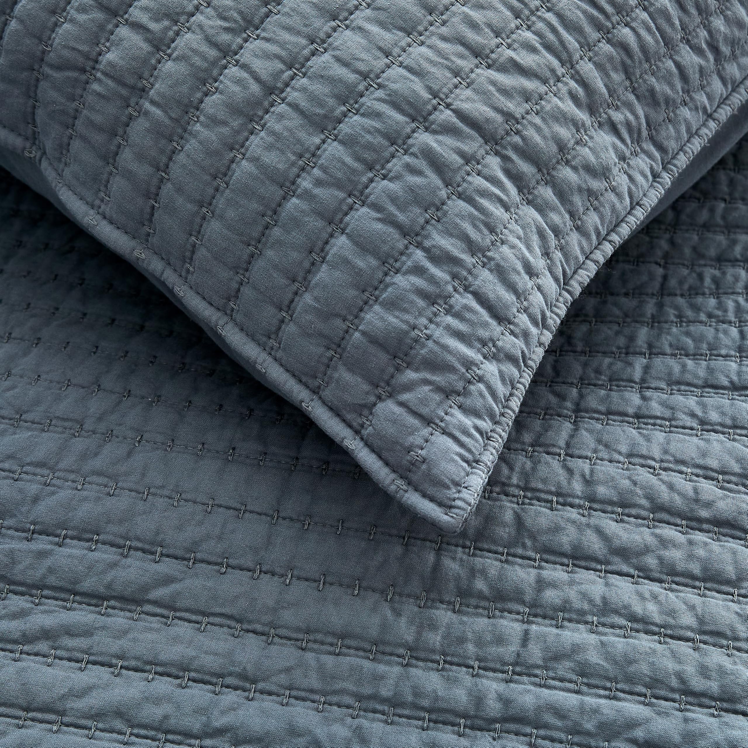 WDCOZY care tag indicates cold wash for long-lasting softness.
