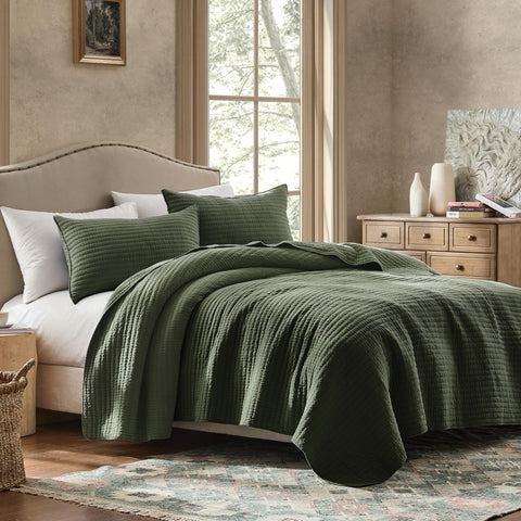WDCOZY textured like linen quilt on a king bed for breathability.