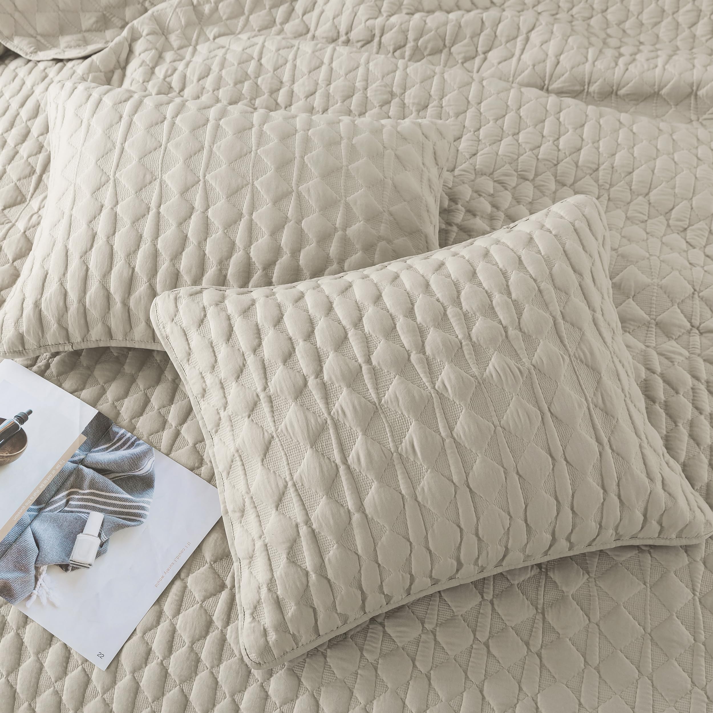 Two WDCOZY pillow shams paired with the Cal King quilt.