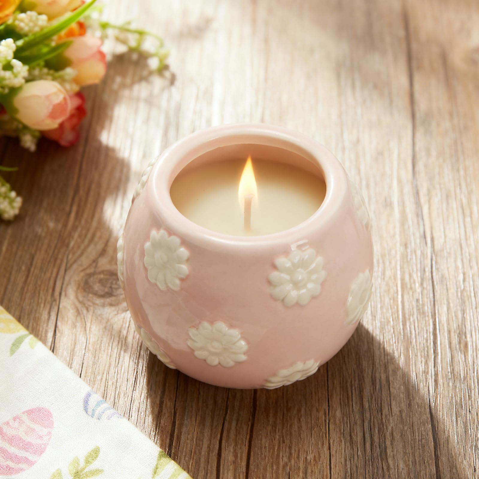 WDS WONDROUS orange-pomegranate scent candle brightens living spaces.
