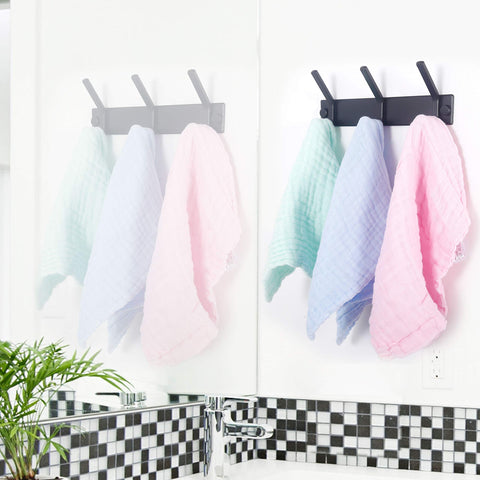 WEBI coat rack in use holding coats and bags in a modern space