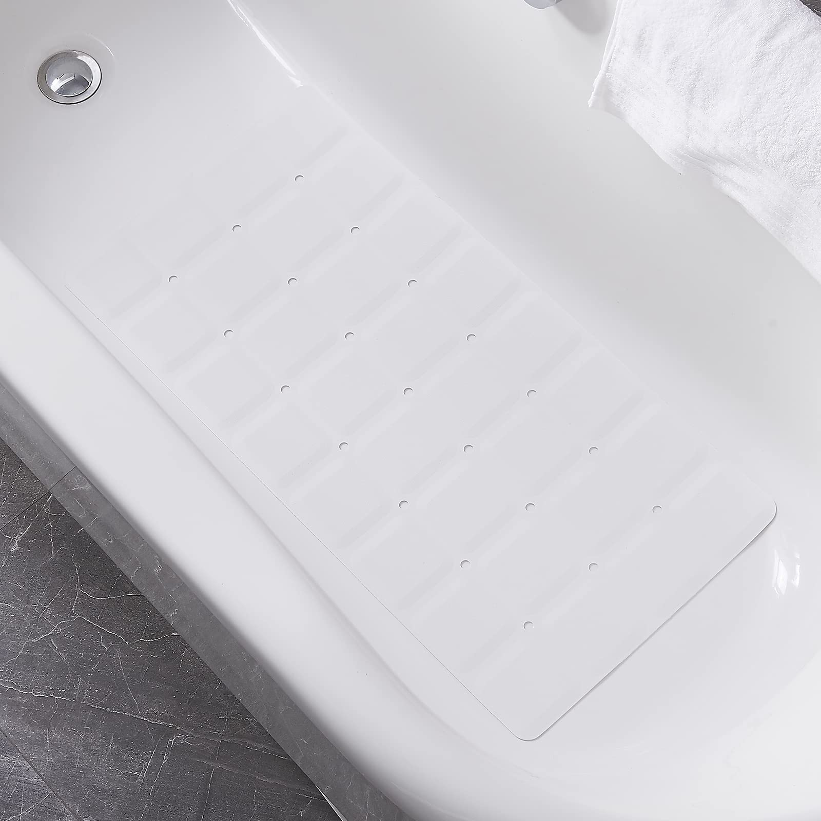Webos foldable non-slip silicone bath mat on white tub for safer entry.