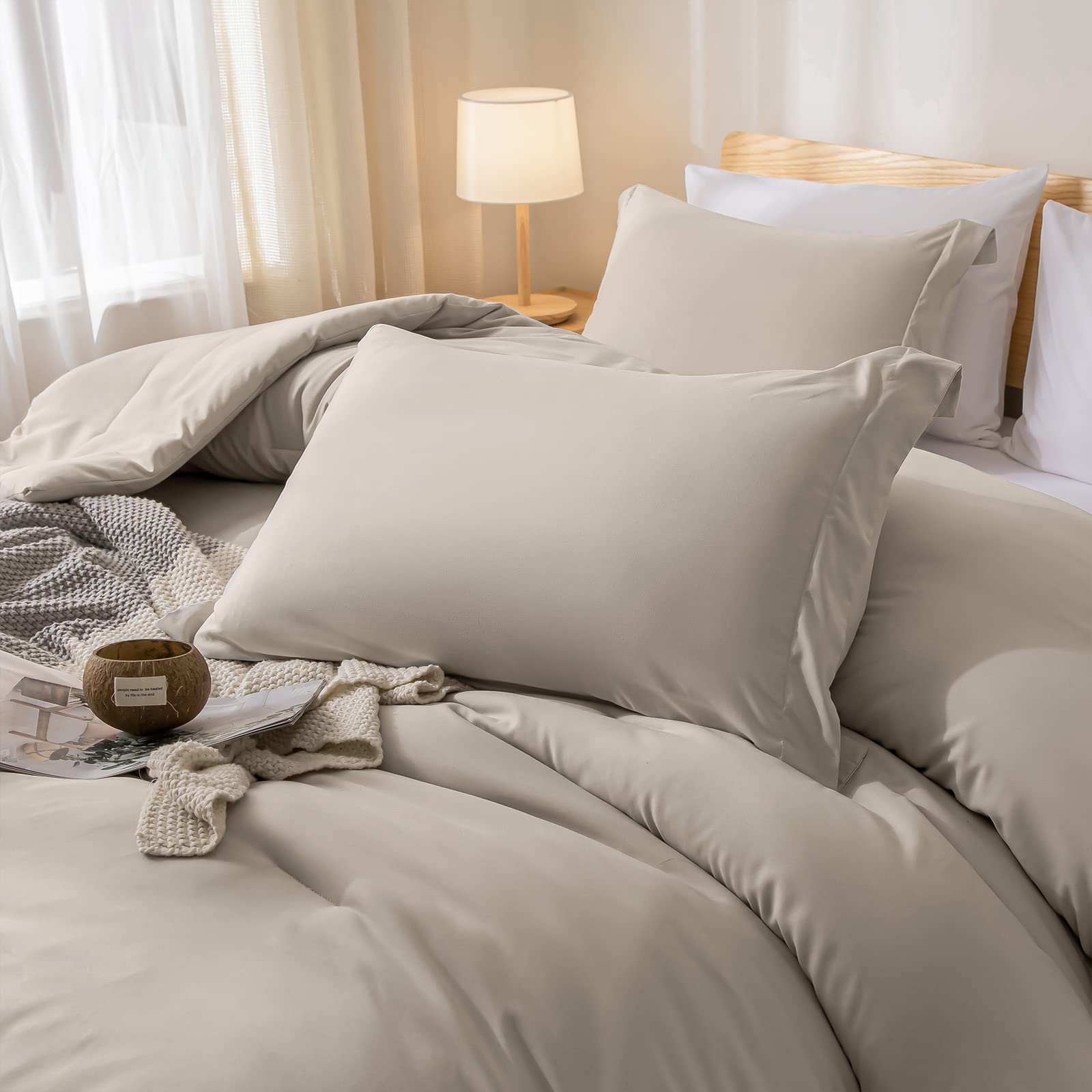 Weigelia cozy bedroom ambience with oatmeal tones and stylish decor.