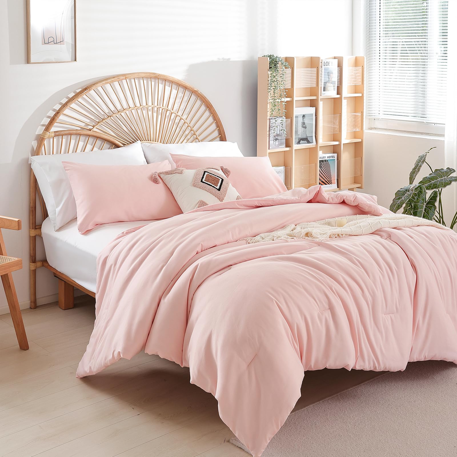 Boho-inspired bedroom with Weigelia pink comforter and coordinating decor.