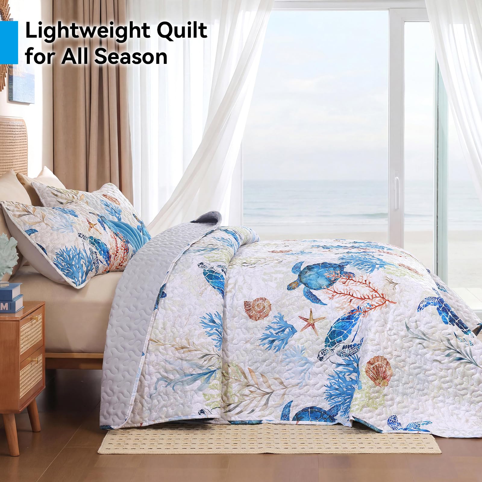 Weigelia coastal quilt shows coral detail for coastal decor.