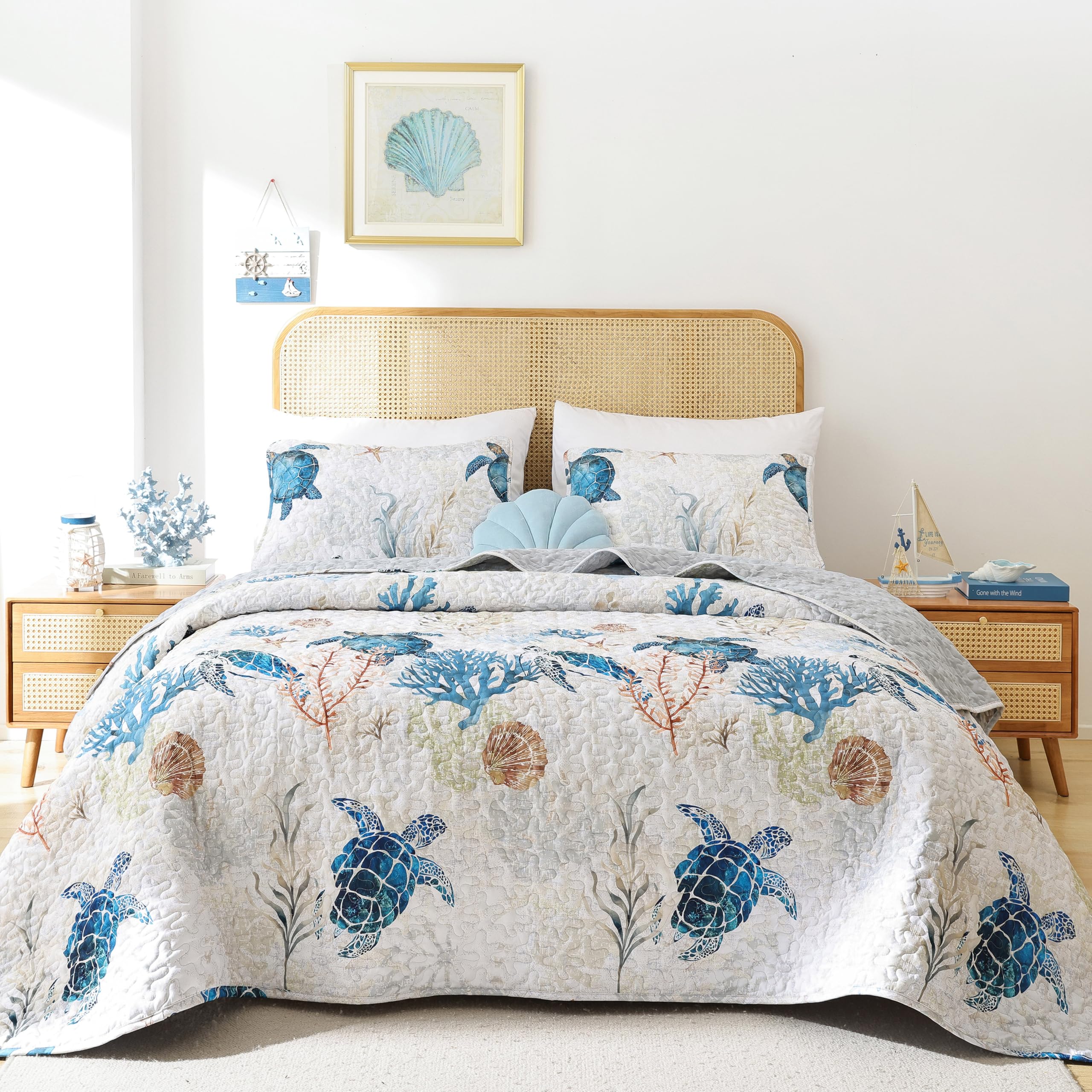 Weigelia coastal quilt with sea turtle print adds seaside charm.