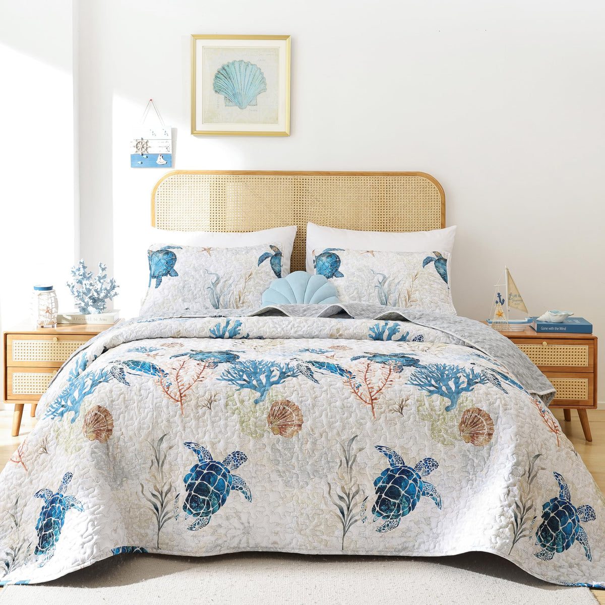 Weigelia coastal quilt with sea turtle print adds seaside charm.