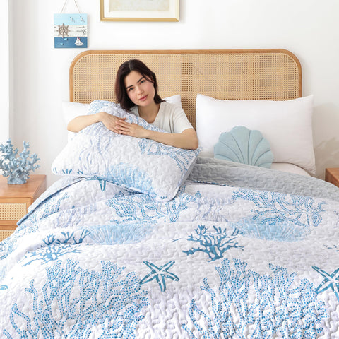 Weigelia Coastal Quilts Queen pillow cases on bed for coastal comfort.