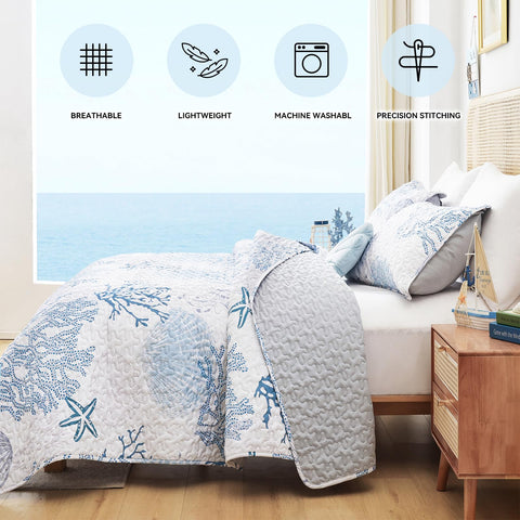 Weigelia coastal quilt shows reversible design for versatile styling.