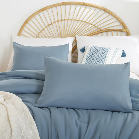 Weigelia lightweight comforter laid on bed emphasizes cozy warmth without bulk