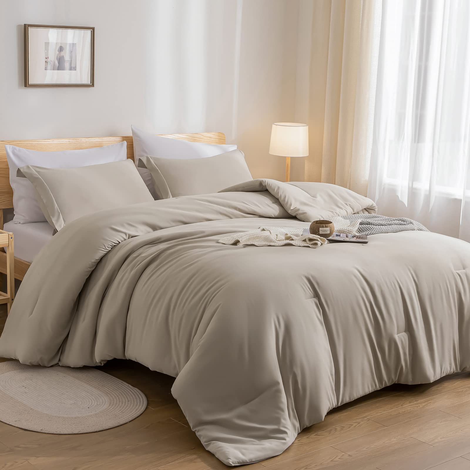 Weigelia oatmeal comforter on bed in flat lay for versatile styling.