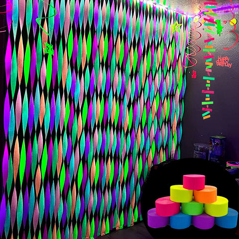 WELITTCON neon paper streamers orange illuminate walls and fluoresce under blacklight.