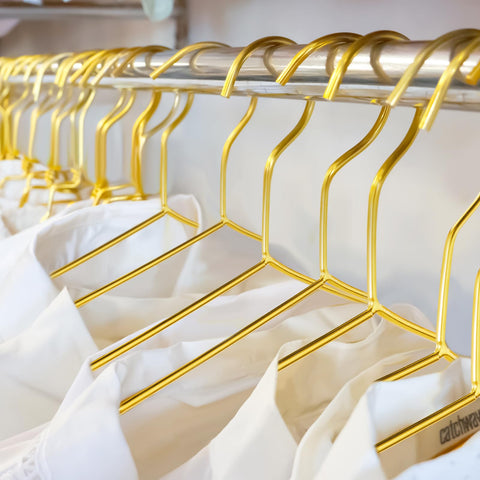 Wesiti boutique gold hangers elevate display while remaining practical