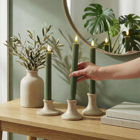 West Ivory loden-green 10-inch LED fluted ribbed taper candle close-up