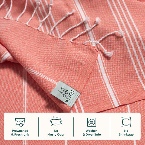 Shake off sand with WETCAT towel for a clean bag.