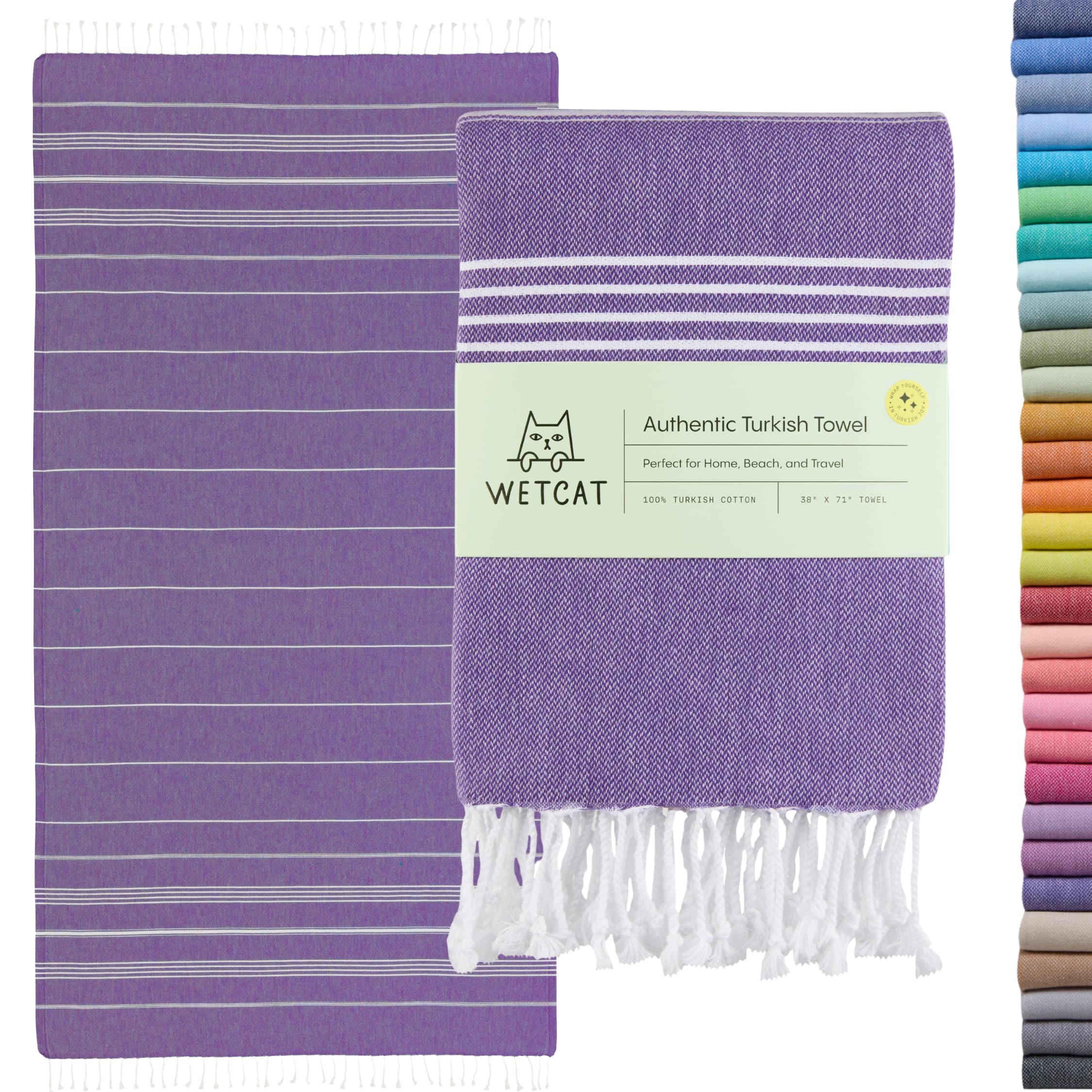 Wetcat Turkish Beach Towel oversize folded, showing compact travel size and softness.