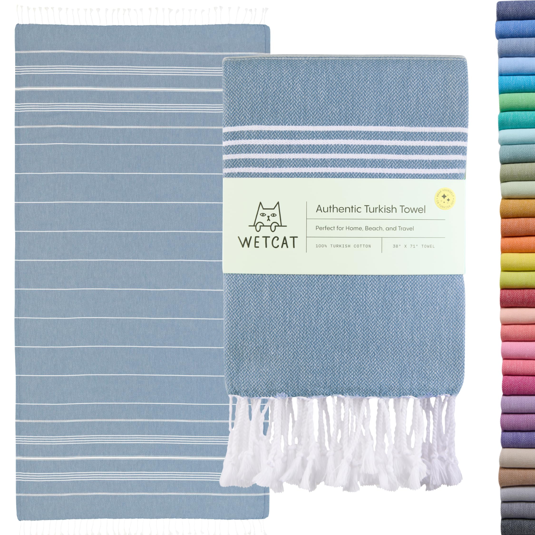 Wetcat Turkish towel in denim blue—oversized and ultra-soft for beach days.