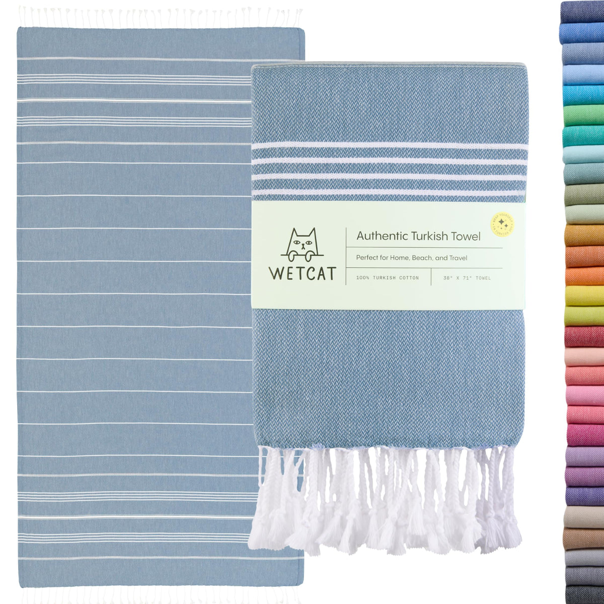 Wetcat Turkish towel in denim blue—oversized and ultra-soft for beach days.