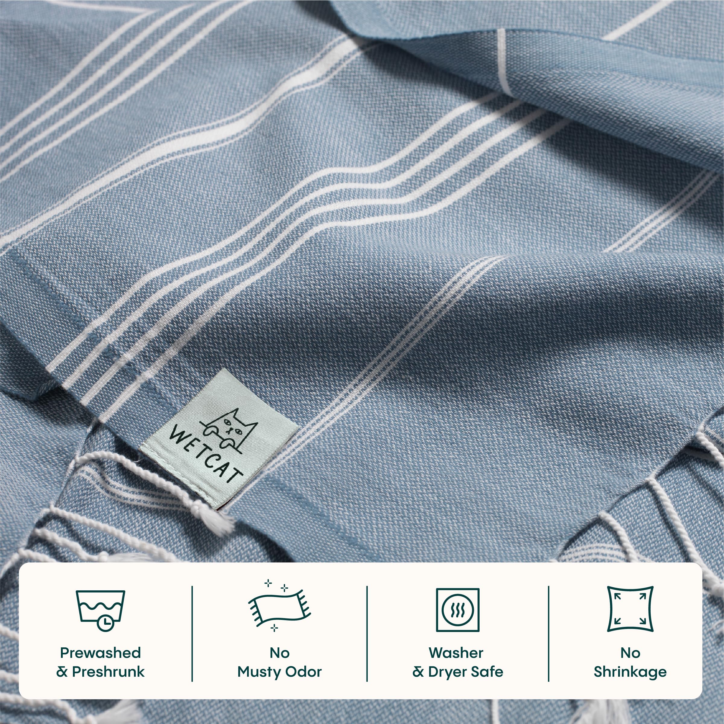 Wetcat Turkish towel in denim blue—sand-free and dries fast.