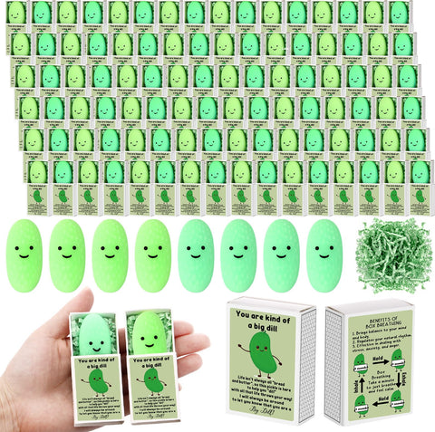 Wettarn pickle stress ball 36-set on a desk, soft squeeze for focus and mood lightening.