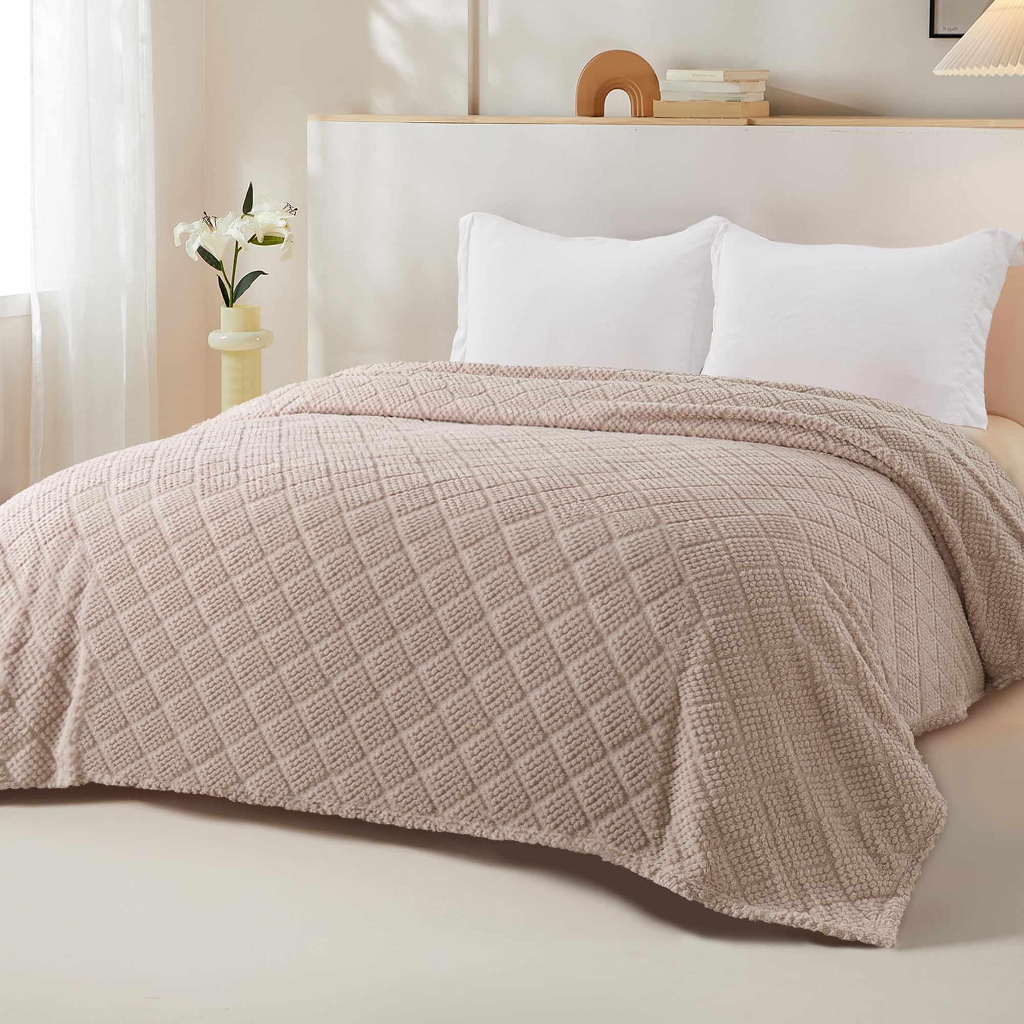 Whale Flotilla couch draped blanket adding stylish coziness