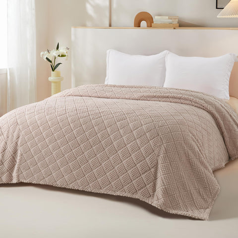 Whale Flotilla couch draped blanket adding stylish coziness