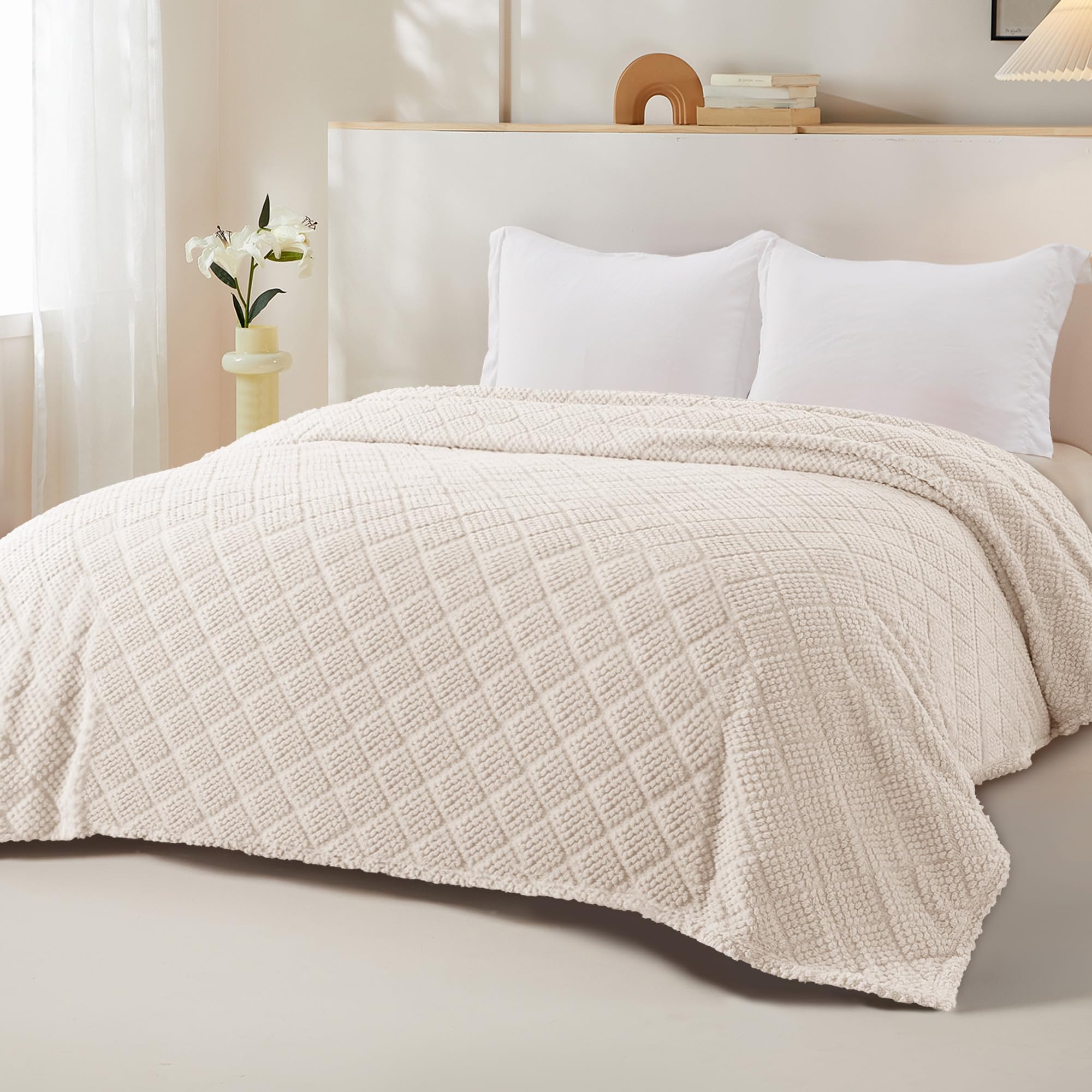 Whale Flotilla jacquard pattern blanket adds subtle luxury