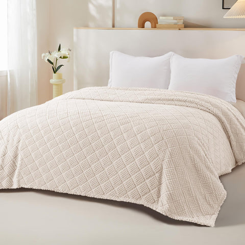 Whale Flotilla jacquard pattern blanket adds subtle luxury