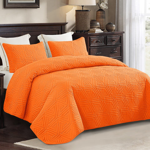 Whale Flotilla geometric quilt three-piece orange adds modern style with lightweight warmth.