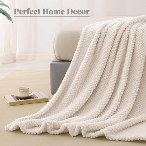 Whale Flotilla king-size blanket shown with bedding for roomy comfort