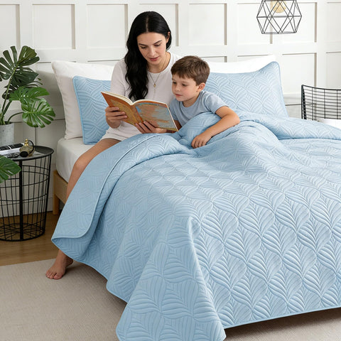 Whale Flotilla queen size quilt 96 by 90 inches on a bed