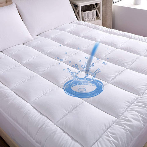 WhatsBedding mattress pad on bed enhances sleep comfort and protects your mattress.