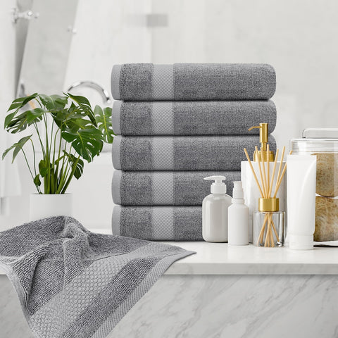 Absorbent White Classic towels in use, providing a comfortable drying experience.