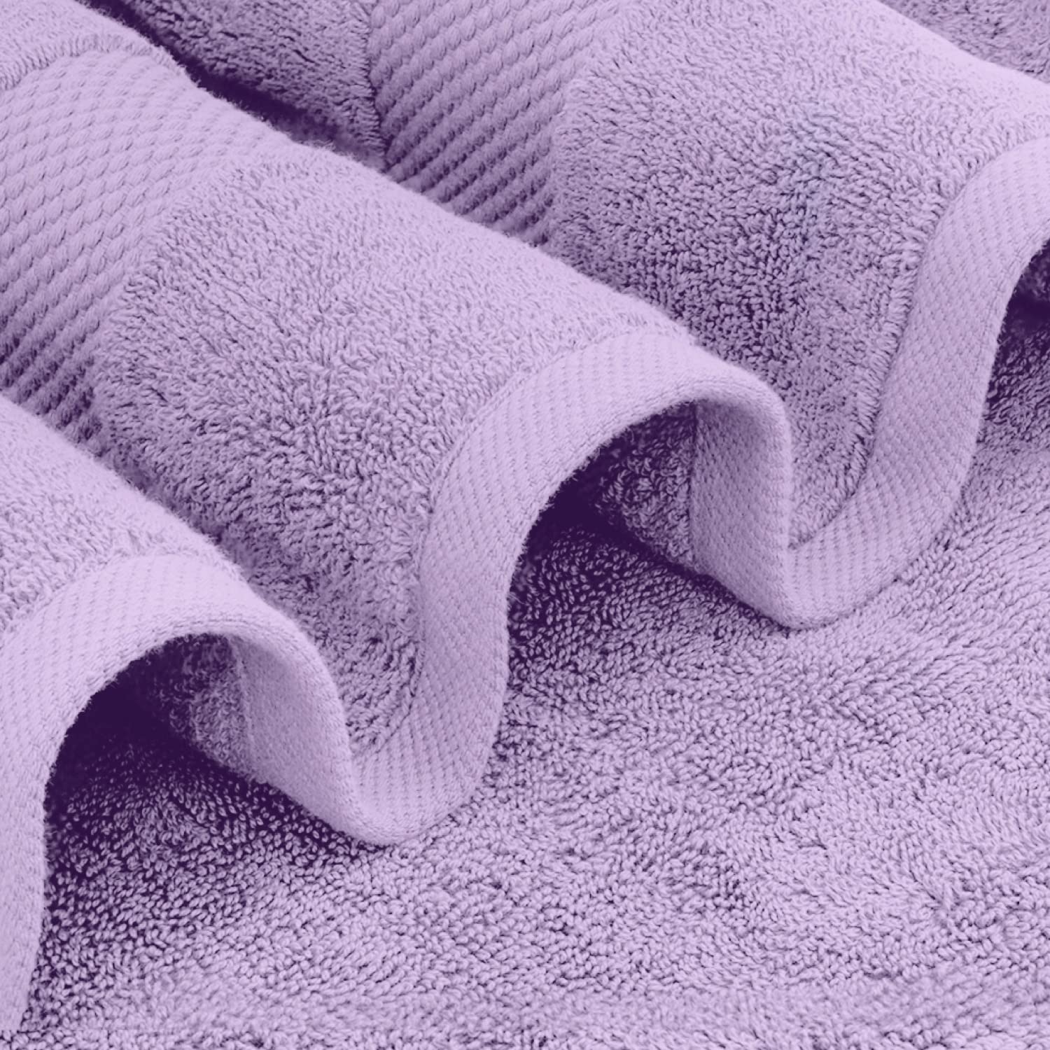 White Classic towel close-up on reinforced double-needle stitching for durability.