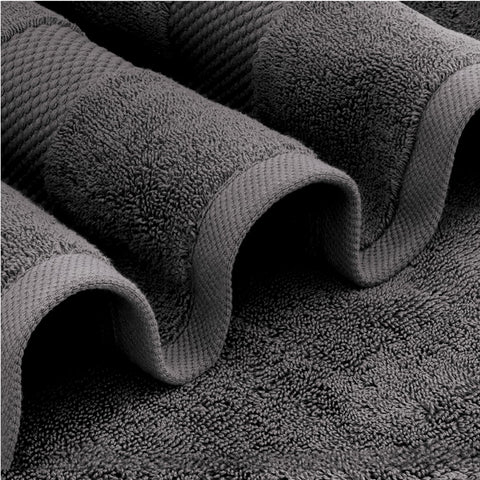 White Classic towel with reinforced double-needle stitching guarding against fraying.