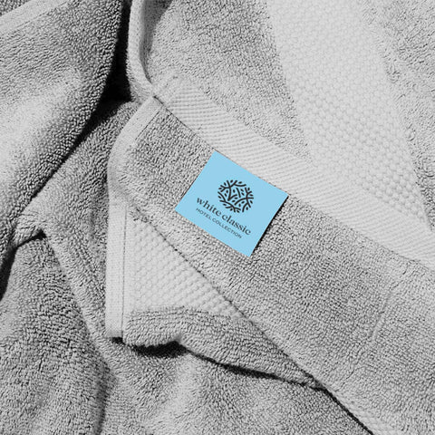 White Classic towel edge stitching detail highlights durability for long-term laundering.
