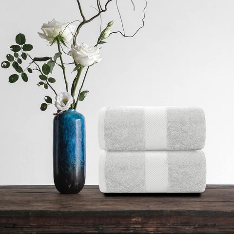White Classic folded towels store display conveys premium home spa vibes.