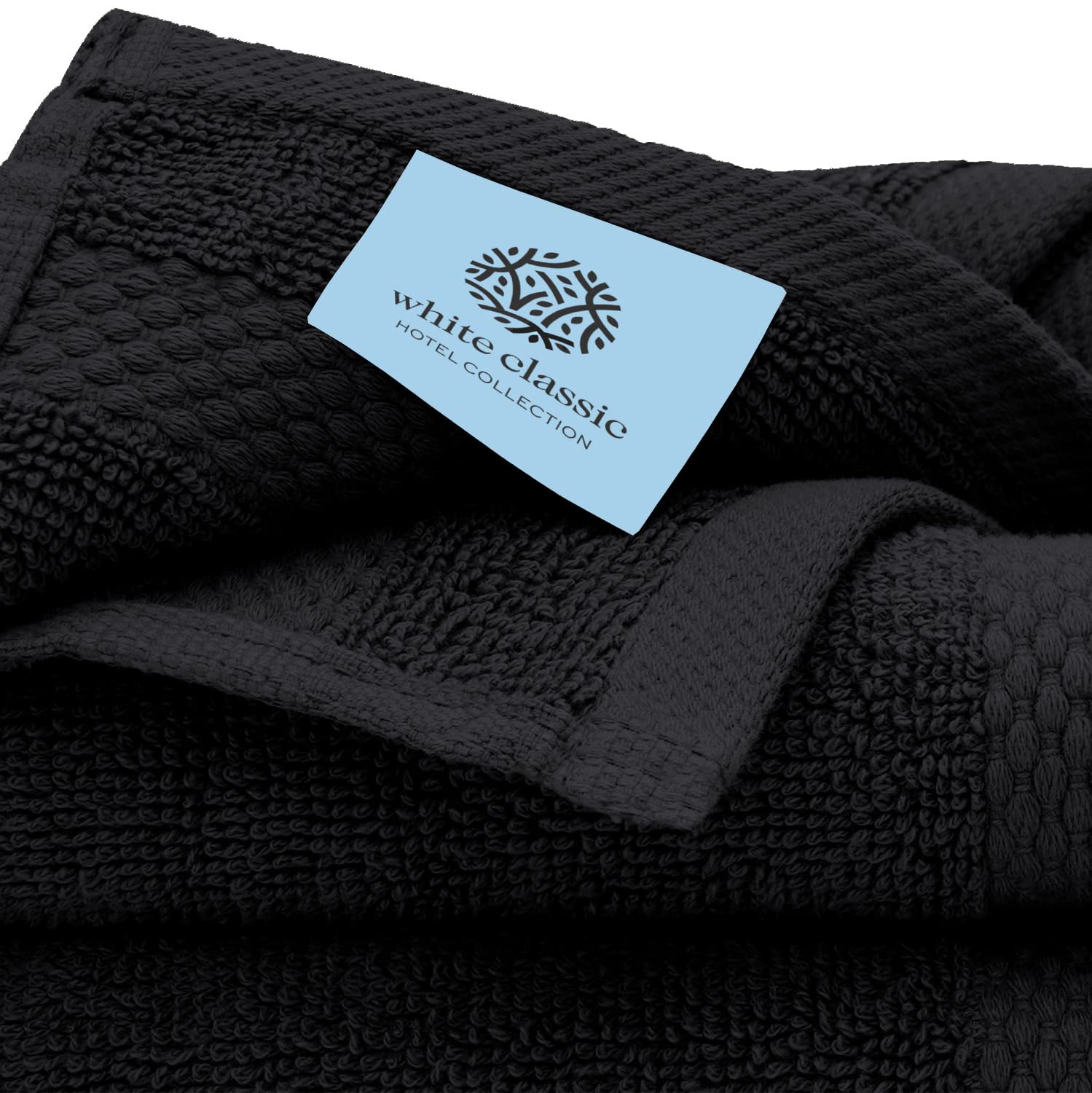 White Classic hand towels displayed with washcloths for daily bathroom use.