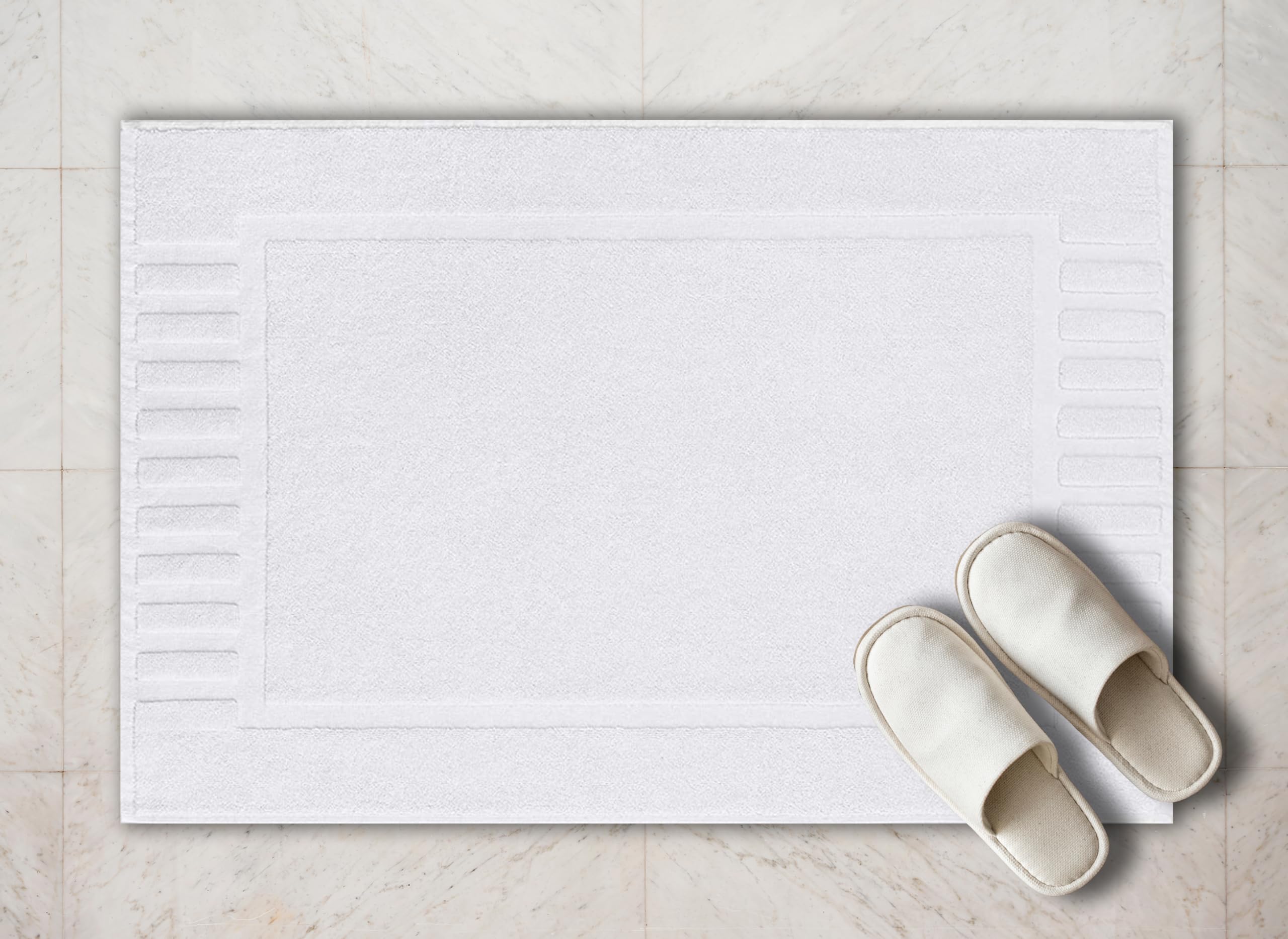 White Classic mats with quick-dry fibers ideal after showers for a fresh space.