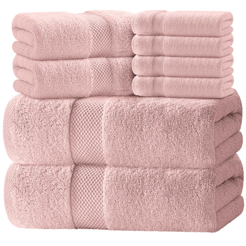White Classic luxury towels close-up in pink showing plush Turkish cotton texture