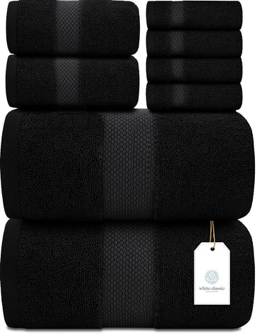 White Classic luxury bath towel set on rack; plush and absorbent.