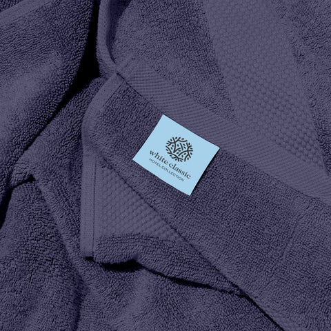 White Classic towel demonstrating quick-drying and high absorbency.