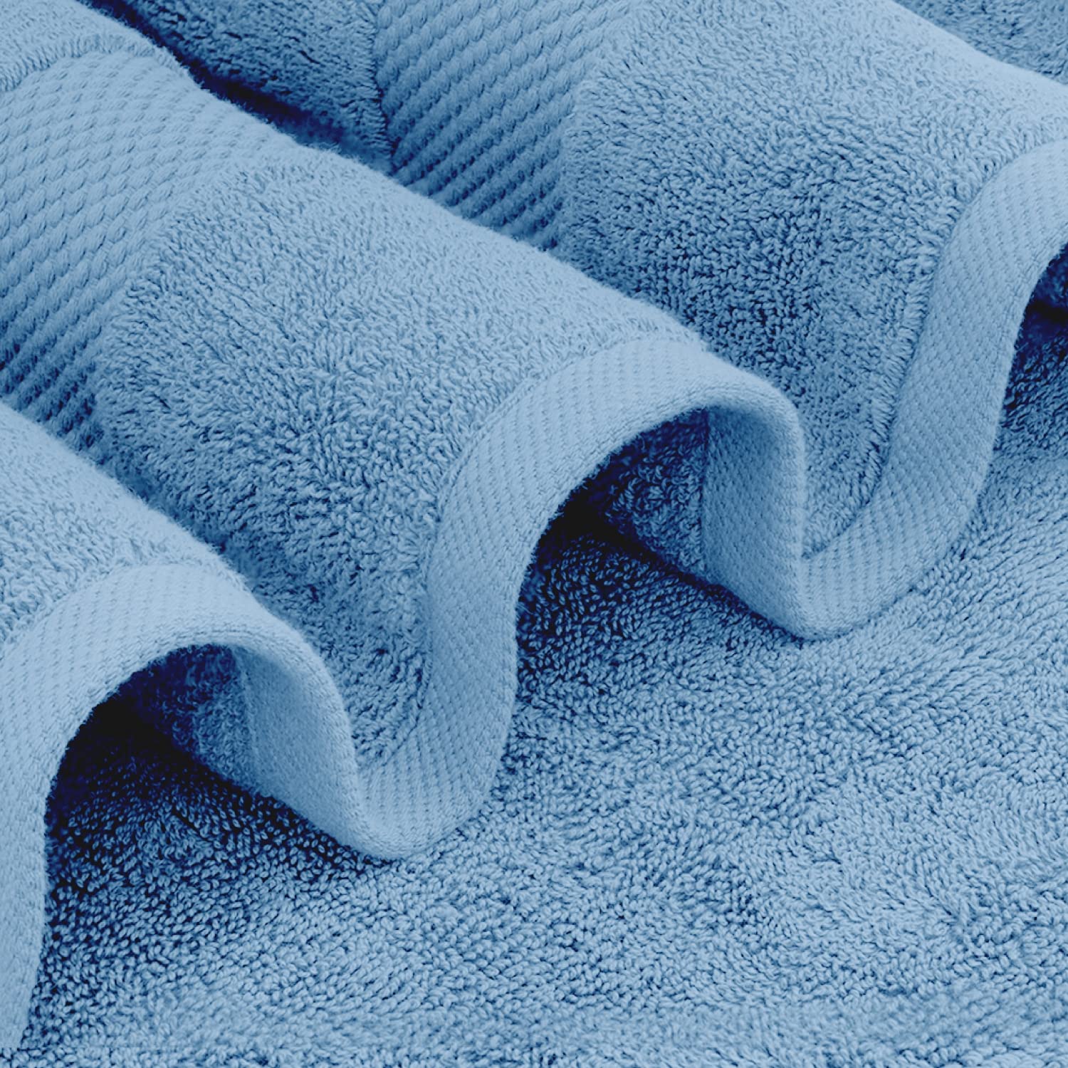 White Classic towel with reinforced edges and double-needle stitching for durability.