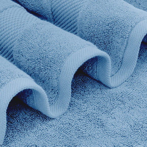 White Classic towel with reinforced edges and double-needle stitching for durability.