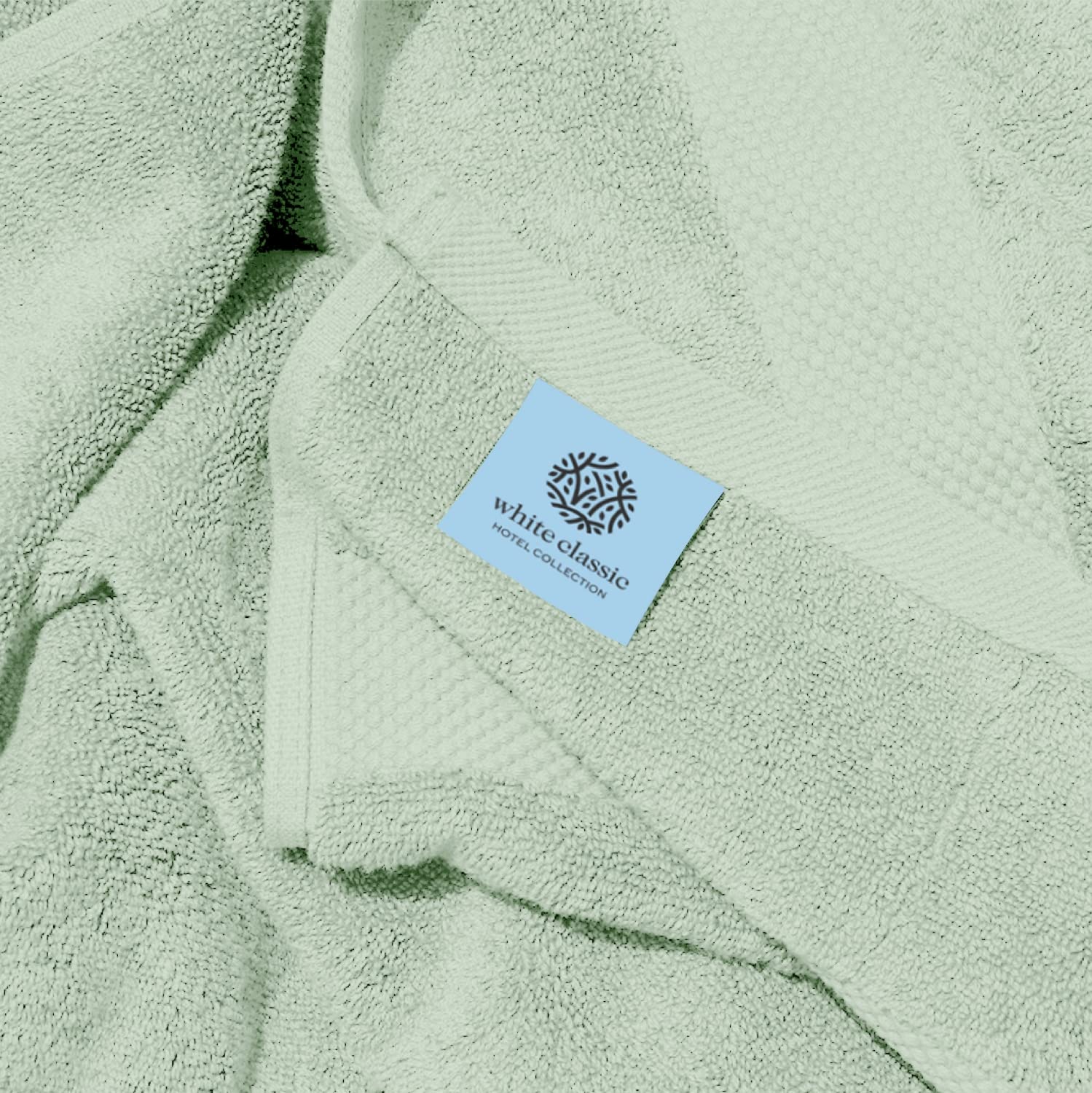 White Classic towel folded to show plushness and care-friendly material